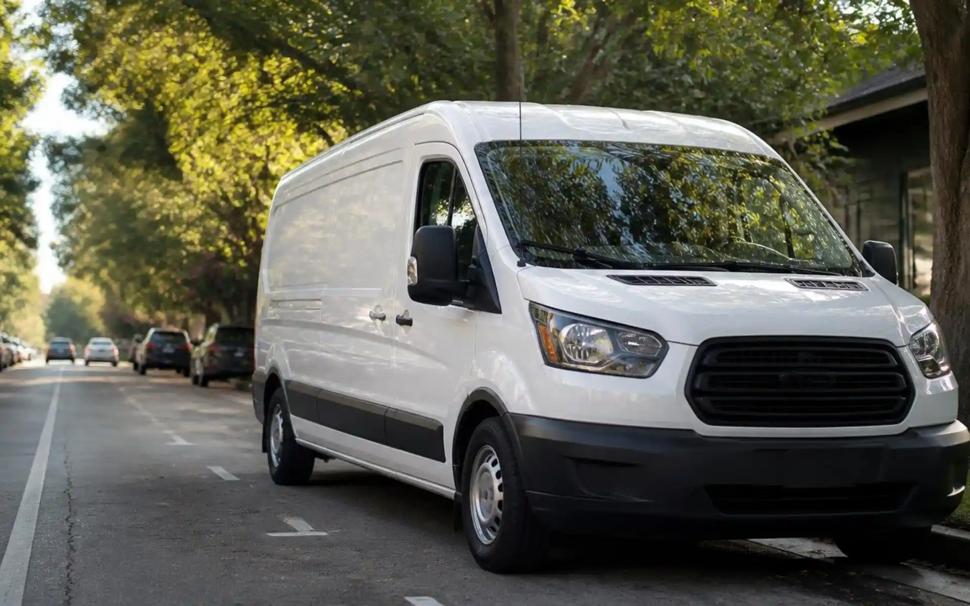 White Charlotte Auto Glass NC mobile service van parked on a residential street in the Charlotte metro